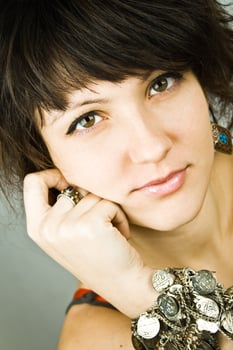 young brunette lady with bracelets photo