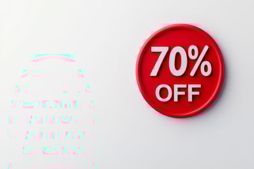 Modern red sale sticker displaying 70 percent off on a clean white background for seasonal discount promotions photo