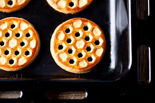 honey cookies on baking sheet photo