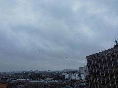 High Angle View of Cardiff City Centre and Buildings at Central Downtown and Near to Ocean Bay During Rainy and Cloudy Day of May 28th, 2024 photo