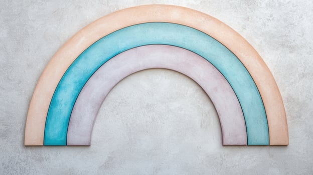 Pastel wooden rainbow arch on concrete wall photo