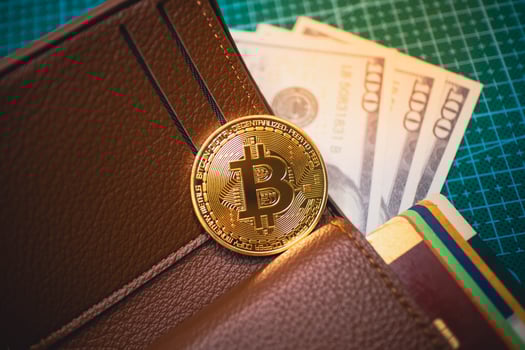 Golden Bitcoin in Wallet with US Dollars and Credit Cards, Cryptocurrency. photo