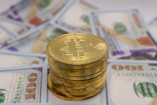 Gold Bitcoin and US Dollars. photo