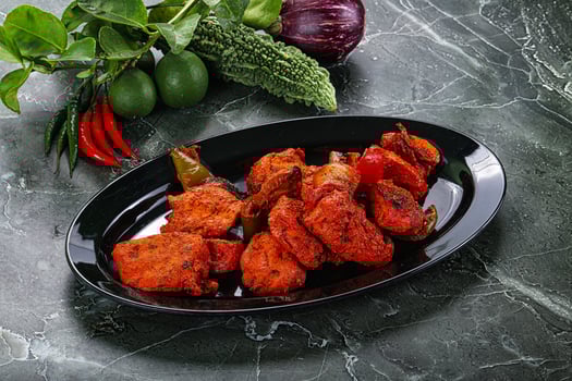 Indian cuisine - chicken tikka barbecue photo