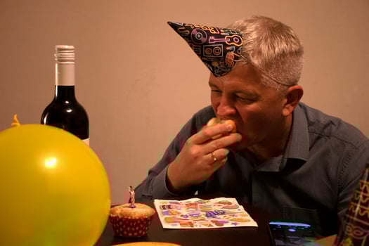 Mid aged man celebrating alone. People photo