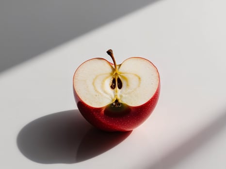 An apple is shown with a bite taken out of it photo