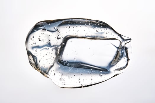 Texture of the hair gel or hyaluronic gel for the face. photo