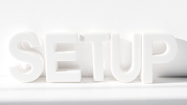white plastic letters spelling setup on a white background photo