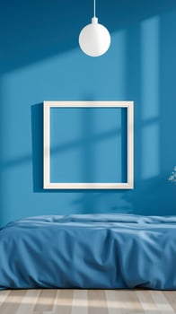white frame hanging on a blue wall photo