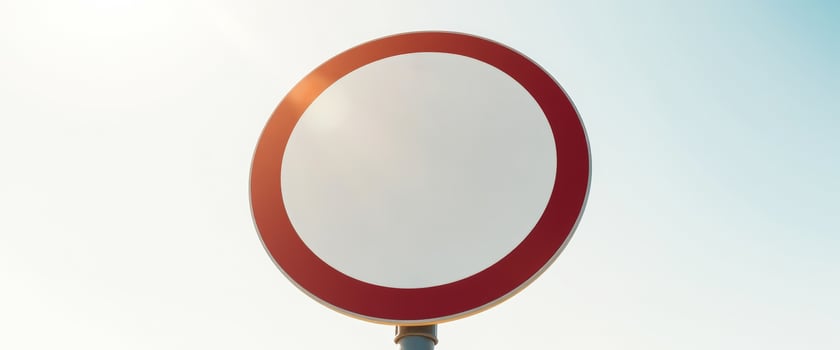 blank round traffic sign with a red border photo