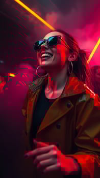 young woman dances under bright red yellow lights at a nightclub photo