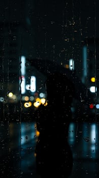 rainy night silhouette photo