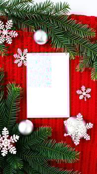 festive card decorated with evergreen branches silver ornaments snowflakes photo