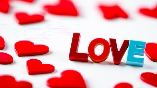 red hearts block letters spell out love photo