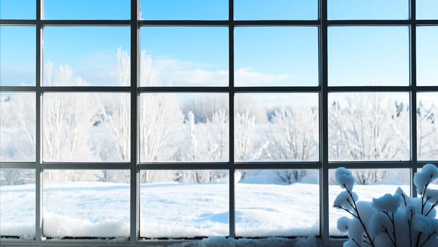frosted window view a snowy landscape photo