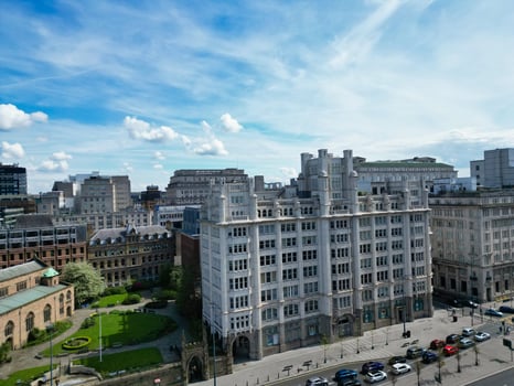 High Angle View of Historical and Modern British City Centre of Liverpool, Maritime city in northwest England, United Kingdom. Aerial Footage Was Captured with Drone's Camera on May 5th, 2024 photo