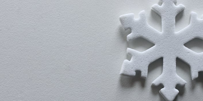 Single Artificial Snowflake Isolated On White With Empty Space Panoramic Image. Winter Greeting Card Design. White 3D Printed Snowflake On White Background photo