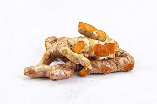 Fresh young Tumeric root heap photo