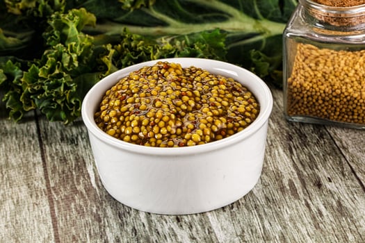 Mustard sauce with seeds in the bowl photo