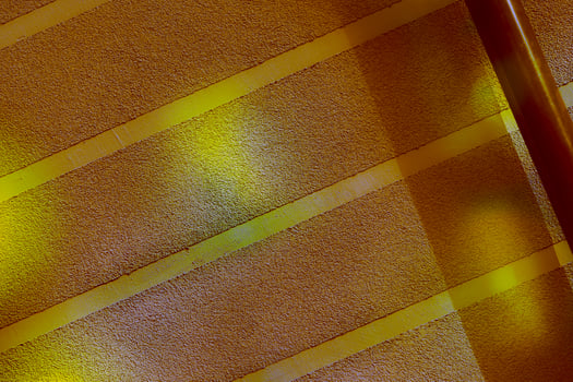 Yellow brown tender light wall surface with stripes photo