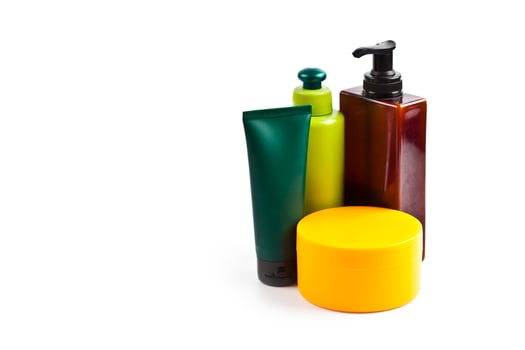 Bath cosmetic products isolated on white background. photo