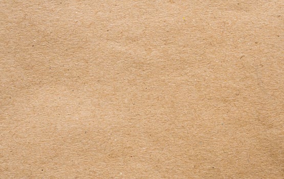 Brown paper eco recycled kraft sheet texture cardboard background photo