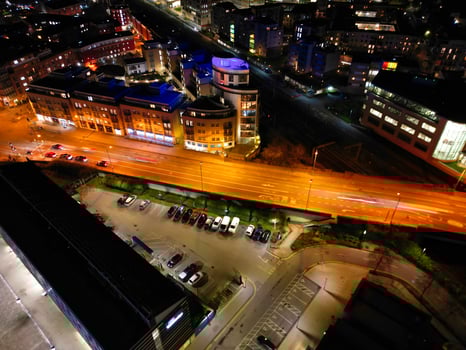Aerial View of Illuminated Central Cambridge City of Cambridgeshire of England UK During Night. High Angle Footage Was Captured with Drone's Camera at Just After Sunset on March 22nd, 2024 photo
