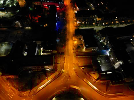 Aerial View of Illuminated Central Cambridge City of Cambridgeshire of England UK During Night. High Angle Footage Was Captured with Drone's Camera at Just After Sunset on March 22nd, 2024 photo
