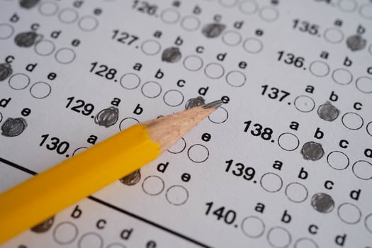 Answer sheets with pencil drawing fill to select choice, education concept. photo