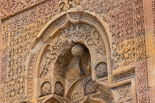 Gate of Great Mosque of Divrigi aka Divrigi Ulucami with carved stone decoration photo