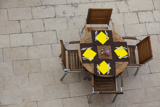 Outdoor summer cafe tables with chairs photo