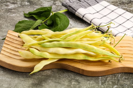 Raw green bean strings heap photo