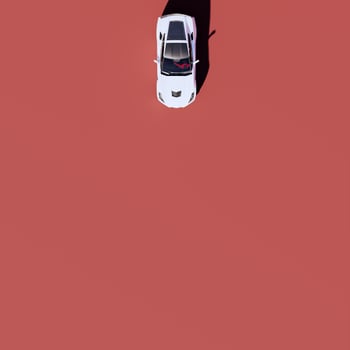 A white car is seen in the air above a red surface photo