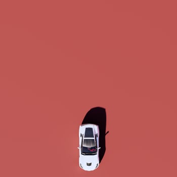 A car on a red background with a red background photo
