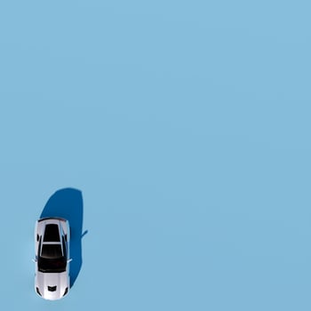 A car is flying over a blue sky photo