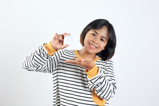 Smiling Asian Kids Pointing on Blank Bank Card photo
