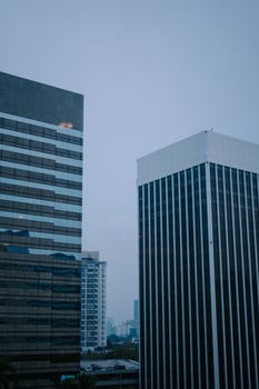 Jakarta skyline with towering skyscrapers under a bright sky photo