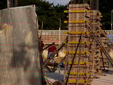 New construction site with beam frame to prepare reinforced concrete columns, foundation work and concrete pouring. Construction industry. photo