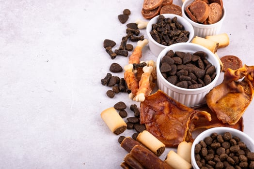Assortment of different dog treats and snack photo