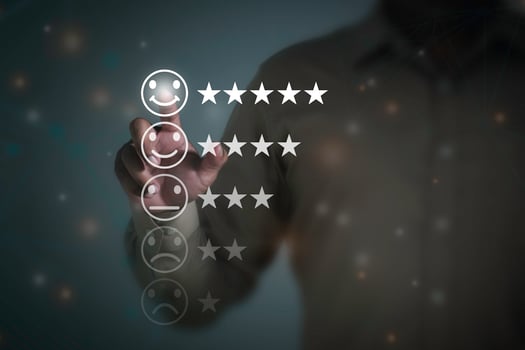 Business people are touching the virtual screen on the happy face icon to give satisfaction in service. Customer service and Satisfaction concept. photo
