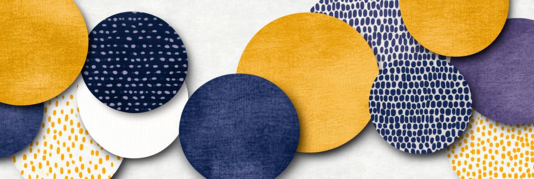 Abstract geometric shapes in mustard yellow, navy blue, and lavender purple with soft lighting on a gradient background photo
