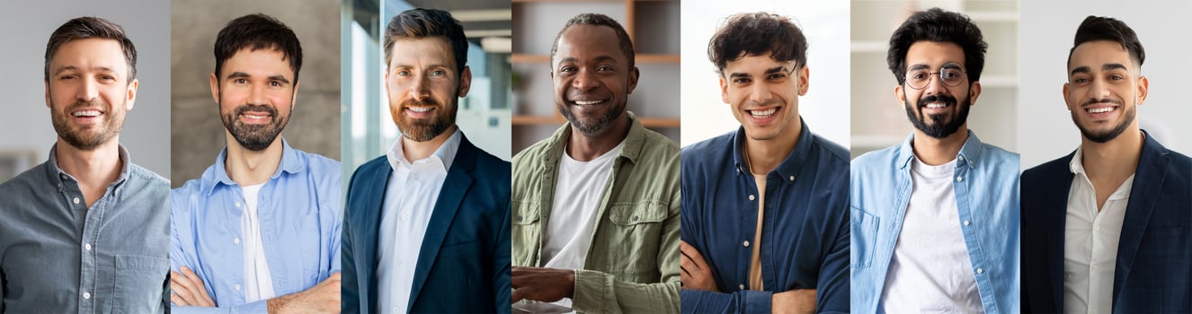 Seven men of varying backgrounds stand together, smiling confidently in a modern office space. Their expressions convey a sense of teamwork and positive collaboration during the day. photo