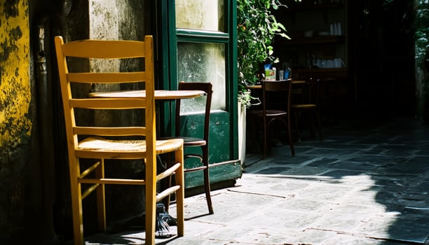 Yellow Chair Outside Cafe. photo