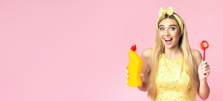Housekeeping Concept. Cute girl in yellow headband holding brush and bottle with detergent, copyspace photo