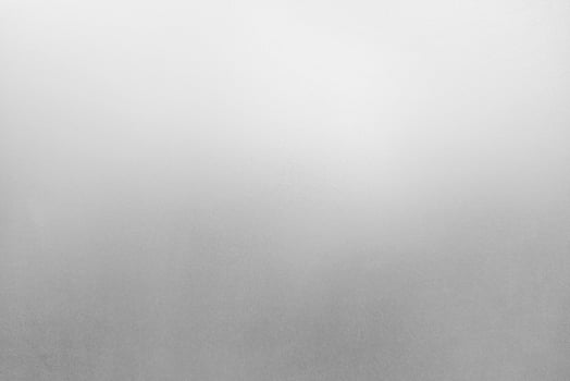 White Frosted Glass Background with Light Beam from Top and grains photo