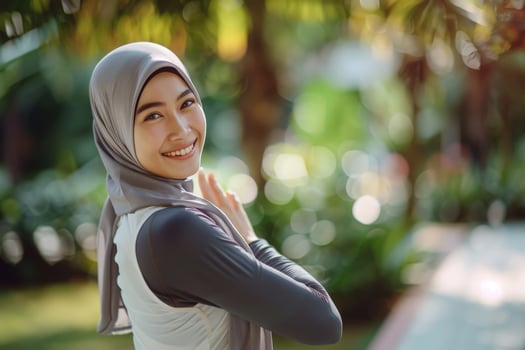 Smiling Woman in a Hijab Background Park photo