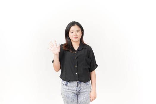 beautiful Asian woman poses with her hands, forming the number 5 against a clean white background photo