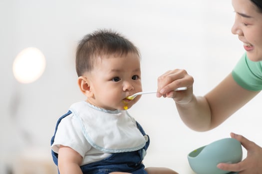 Mom and baby's breakfast time photo
