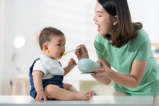 Mom and baby's breakfast time photo