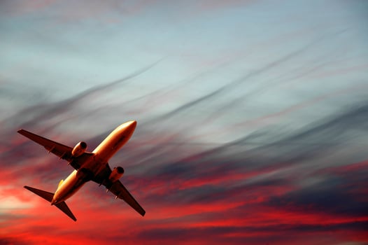 Air travel - plane and sunset photo